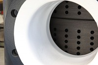 Graphite block heat exchanger equipped with a PTFE lined shell